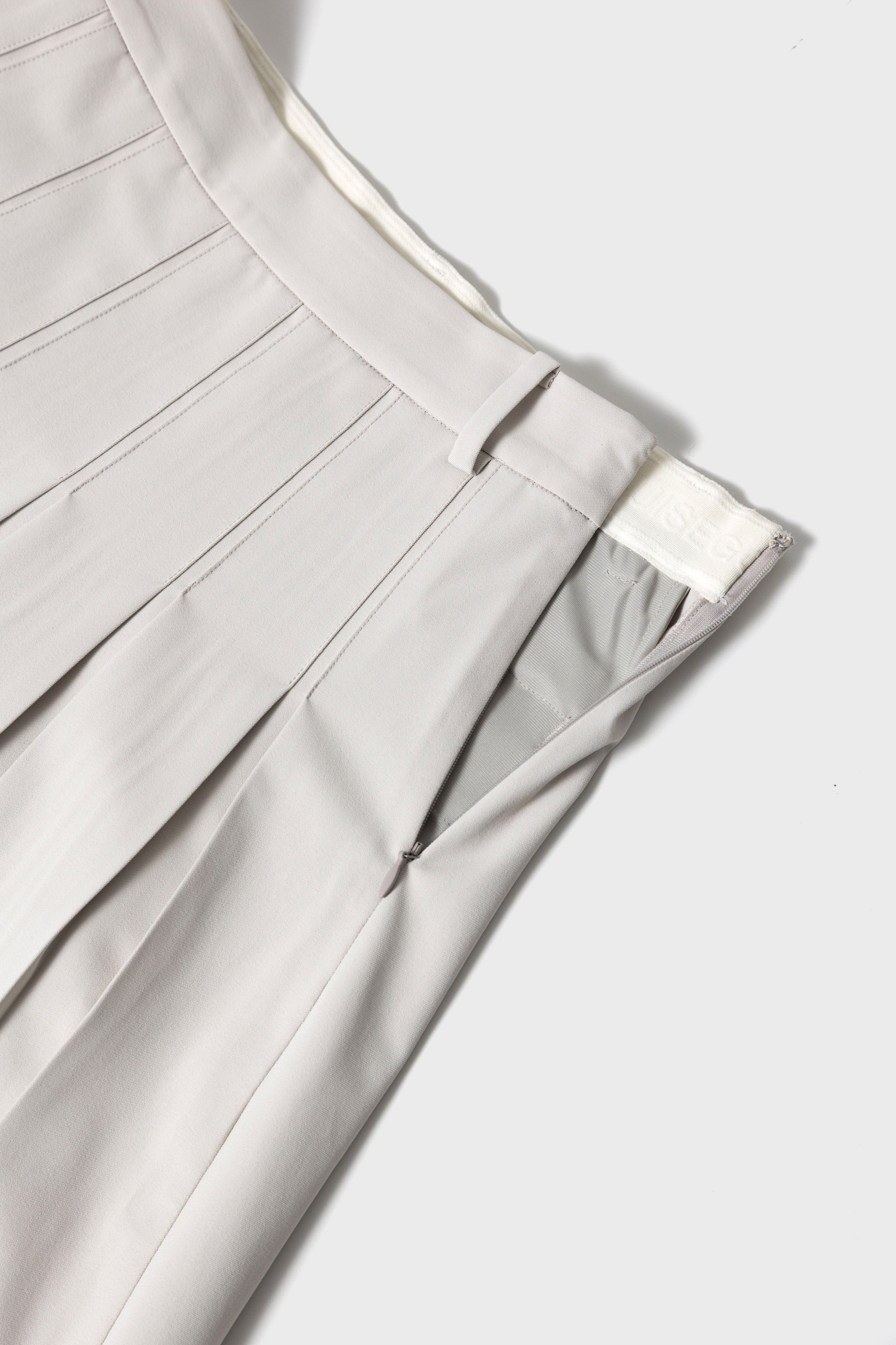 ESSENTIAL GOLF PLEATS SKIRT - LightBeige